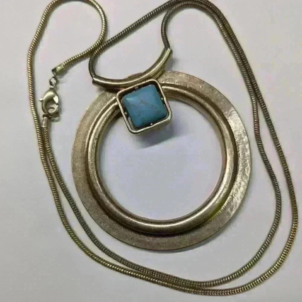 Long Statement Necklace w/ large gold 4" circular pendant turquoise accent